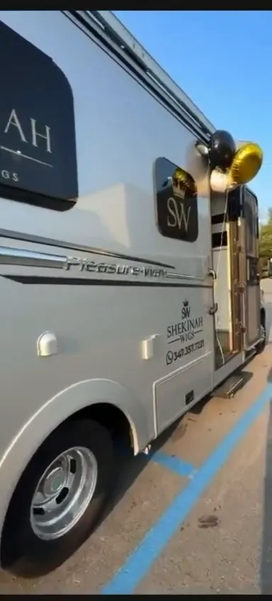 The Shekinah Wigs on Wheels van